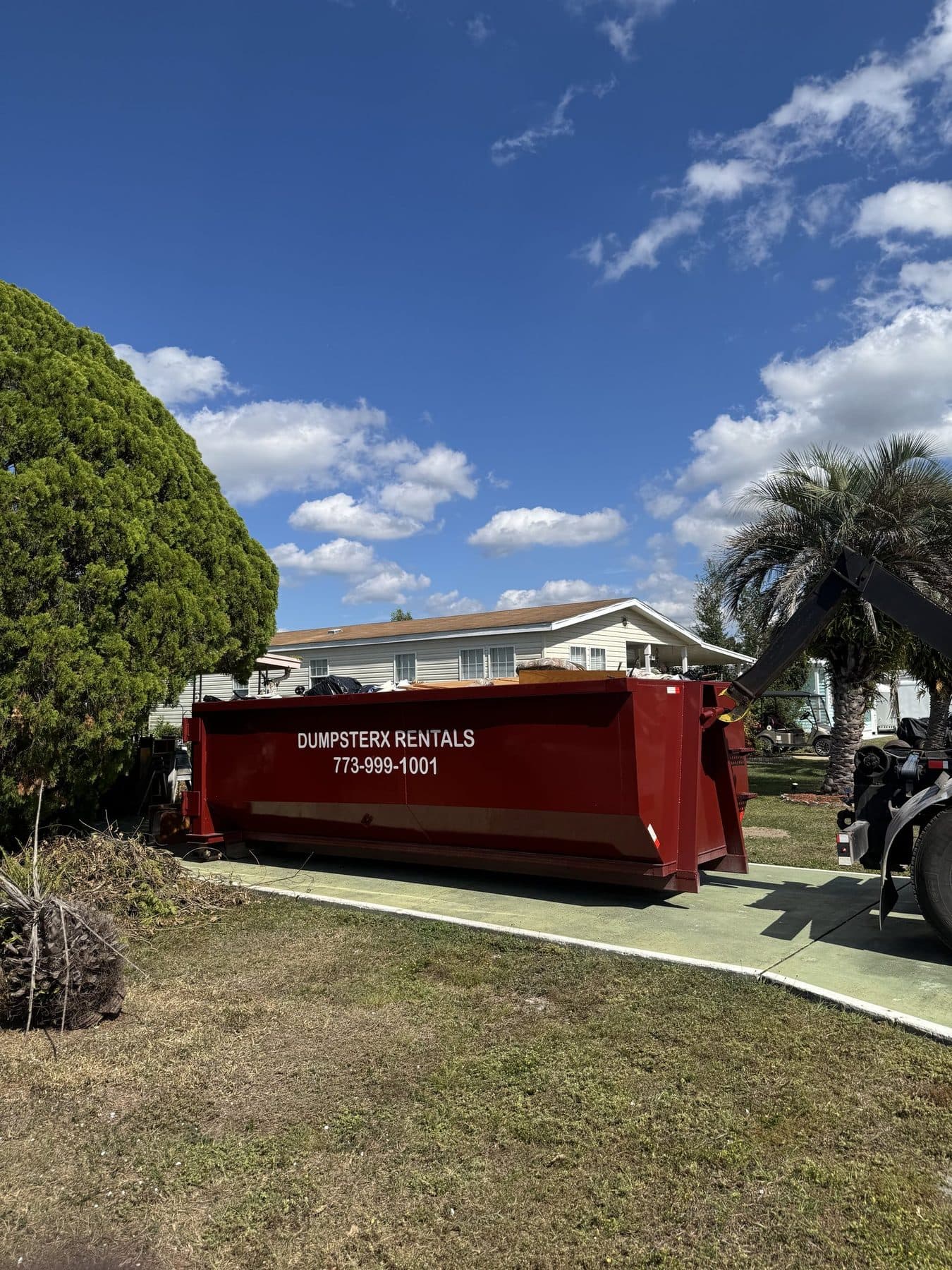 22 yard DumpsterX roll-off dumpster on a residential job
