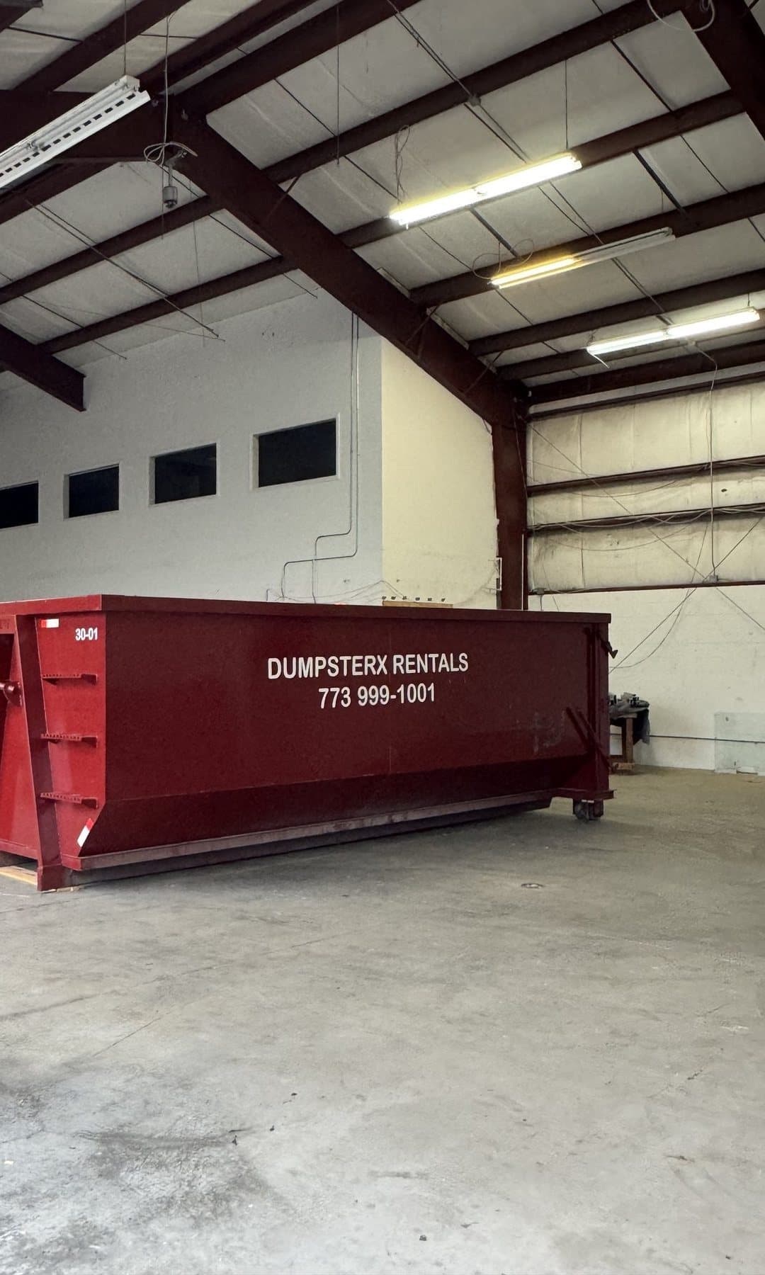 DumpsterX roll-off dumpster in the shop